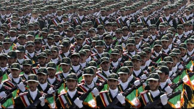 IRGC troops march during a military parade near Tehran.