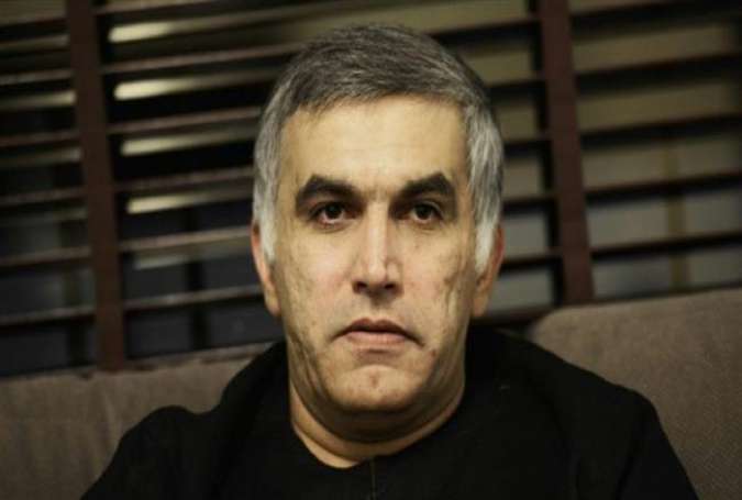 A file picture taken on November 2, 2014, shows Bahraini human rights activist Nabeel Rajab looking on at his home in the village of Bani Jamrah, West of Manama, upon his release on bail. (Photo by AFP)