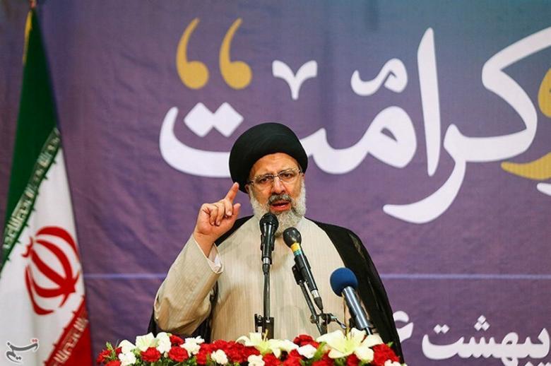 Ebrahim Raisi gestures in this photo on May 9, 2017.