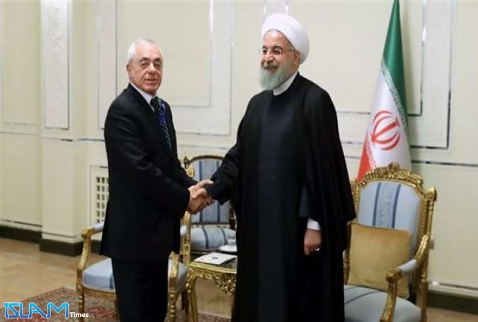 روحاني: ايران مستعدة لتطوير علاقاتها وتعاونها مع الجزائر