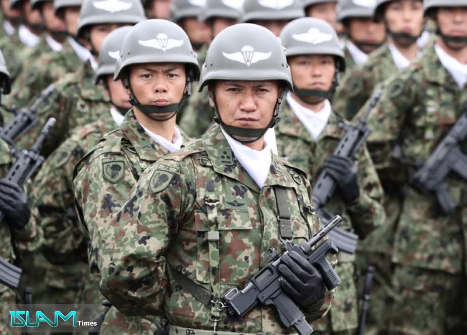 Japan discloses revised military plans