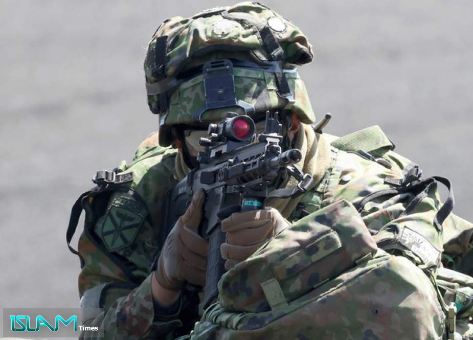 A Japanese soldier during an exercise in the Shizuoka Region of Japan, March 2022.
