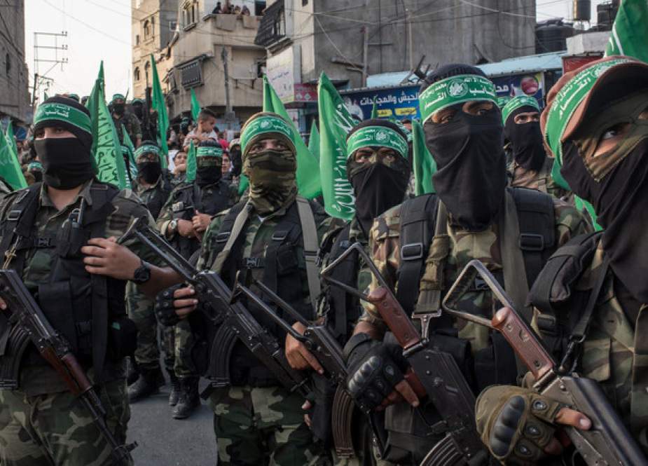Palestinian Hamas militants are seen during a military show in the Bani Suheila district in Gaza City, Gaza