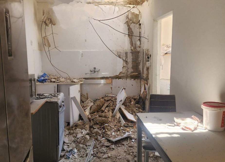 Damage in a building in Kiryat Shmona due to rocket fire from south Lebanon