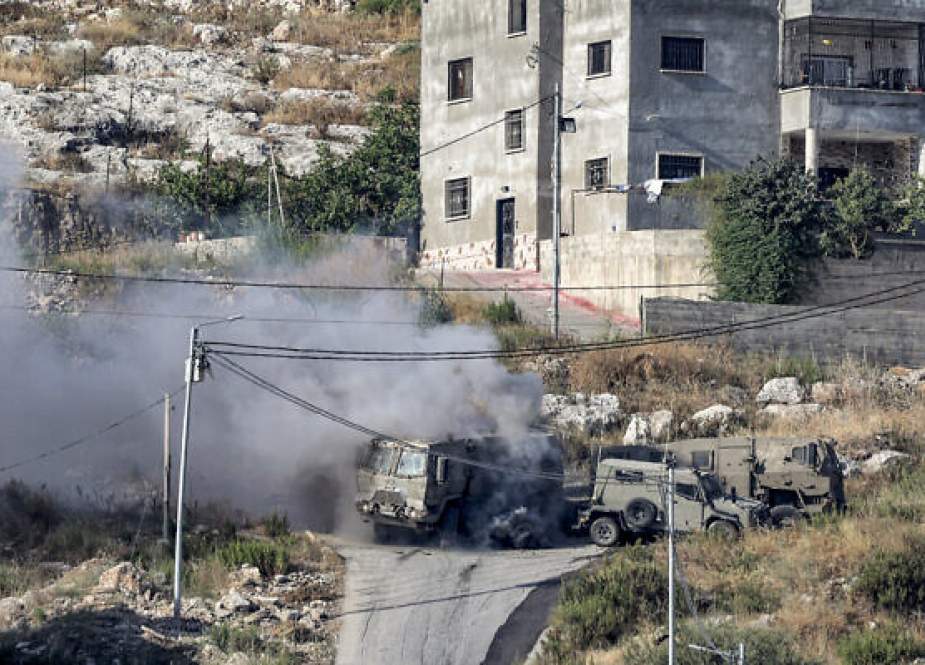 An Israeli armoured vehicle during an Israeli army raid in Jenin