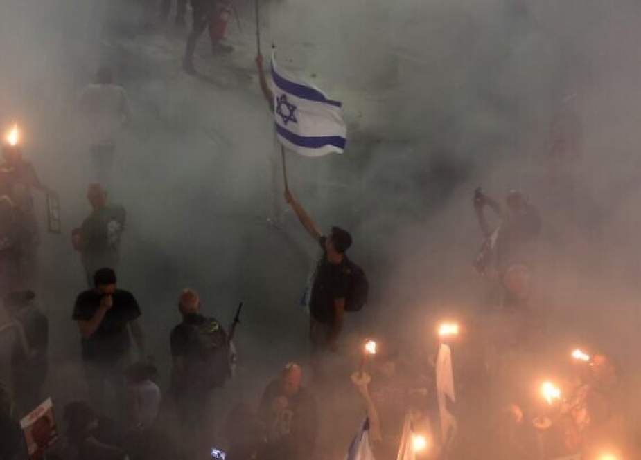 Israeli protesters demonstrate in Tel Aviv against occupation government
