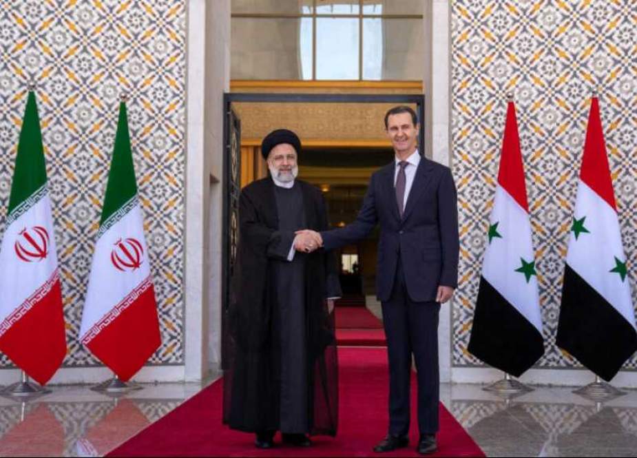 Syrian President Bashar Al-Assad and Iranian President Ebrahim Raisi