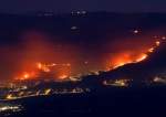 Fire Rages in Israeli Settlements in Occupied north