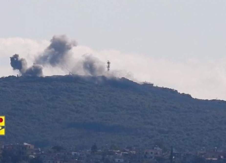 Smoke billows after Hezbollah fighters struck a the Israeli al-Raheb military outpost