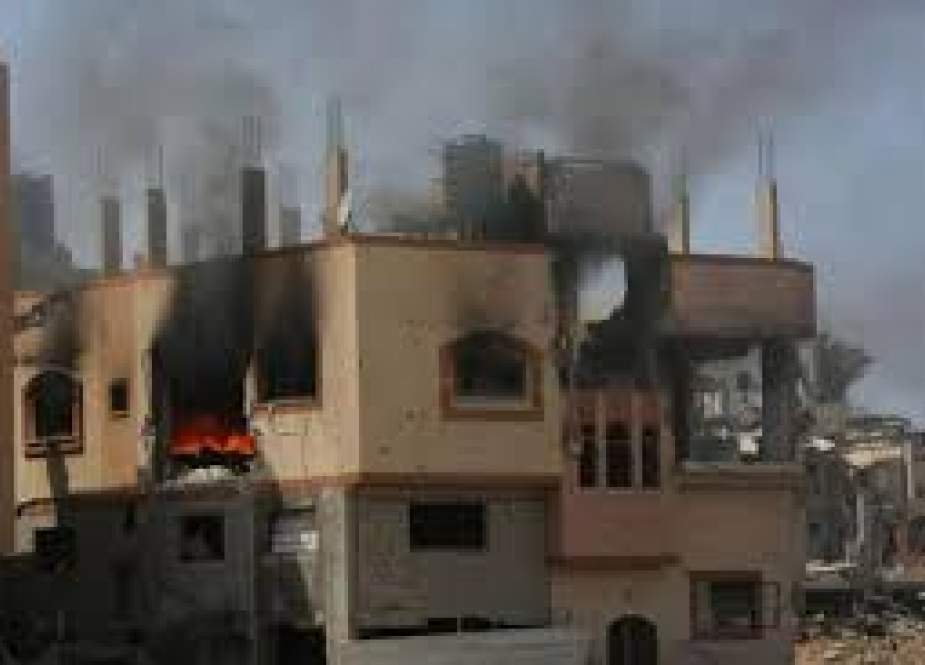 Bangunan-bangunan yang terbakar dan rusak akibat serangan Israel di kamp pengungsi Nuseirat di Jalur Gaza