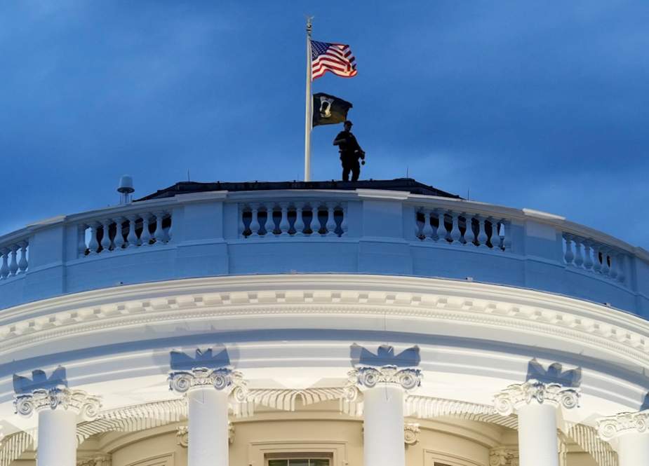 US Secret Service stands on the roof of the White House during a Juneteenth concert on the South Lawn of the White House in Washington