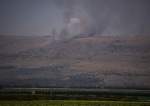 Smoke rises to the sky as a fire burns an area after a Lebanese retaliatory strike in the occupied Golan