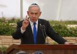 Israeli Prime Minister Benjamin Netanyahu speaks during a ceremony at the Nahalat Yitzhak Cemetery in occupied Palestine