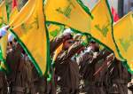 Hezbollah fighters raise their group flags
