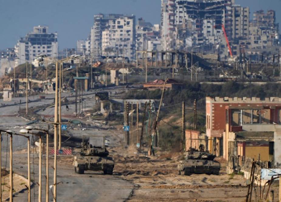 Israeli occupation forces tanks are seen in Wadi Gaza, central Gaza Strip, Palestine