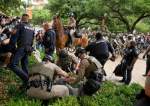 Texas state troopers arrest a man at a pro-Palestinian protest at the University of Texas