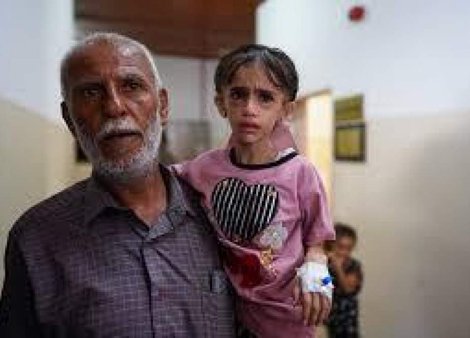 Palestinian-children-suffering-from-malnutrition-or-chronic-diseases-wait-with-family-members-at-Nas