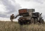 Ukrainian soldiers prepare the BM-21 multiple rocket launcher